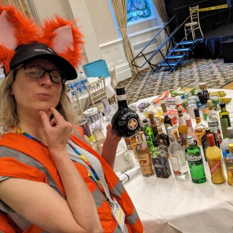 Funcon chair holding a dubious bottle