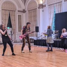 People playing Air Guitar